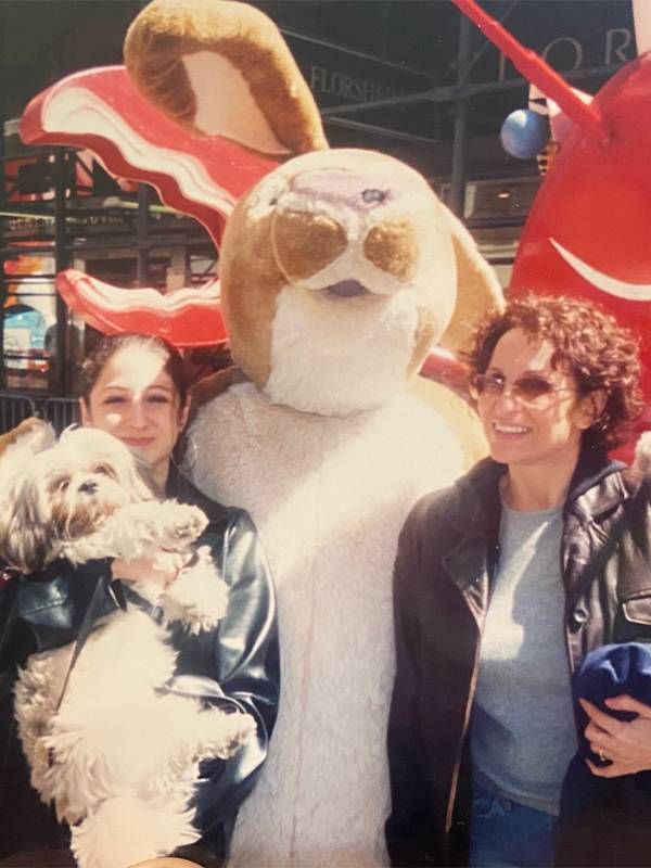 The author with her motherstanding with a mascot. Next Avenue, 9/11, september 11, middle school 