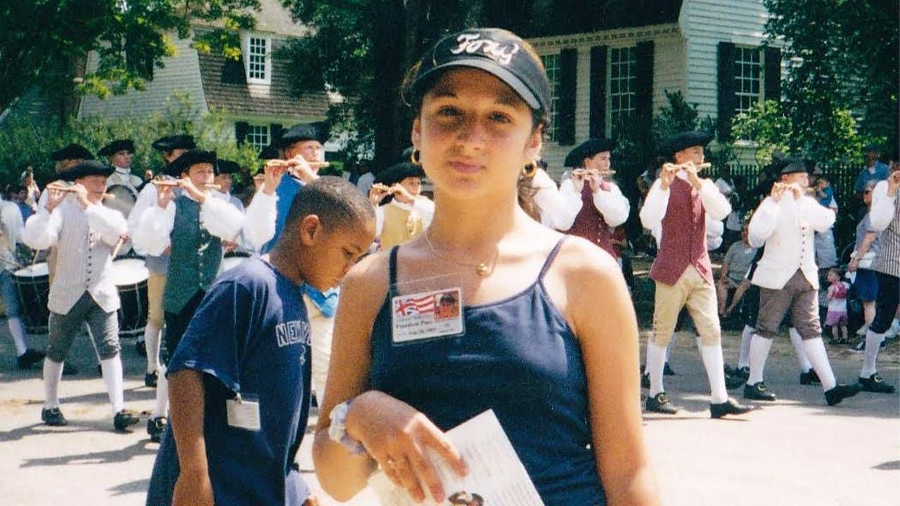 The author as a middle schooler standing near a parade. Next Avenue, 9/11, september 11, middle school