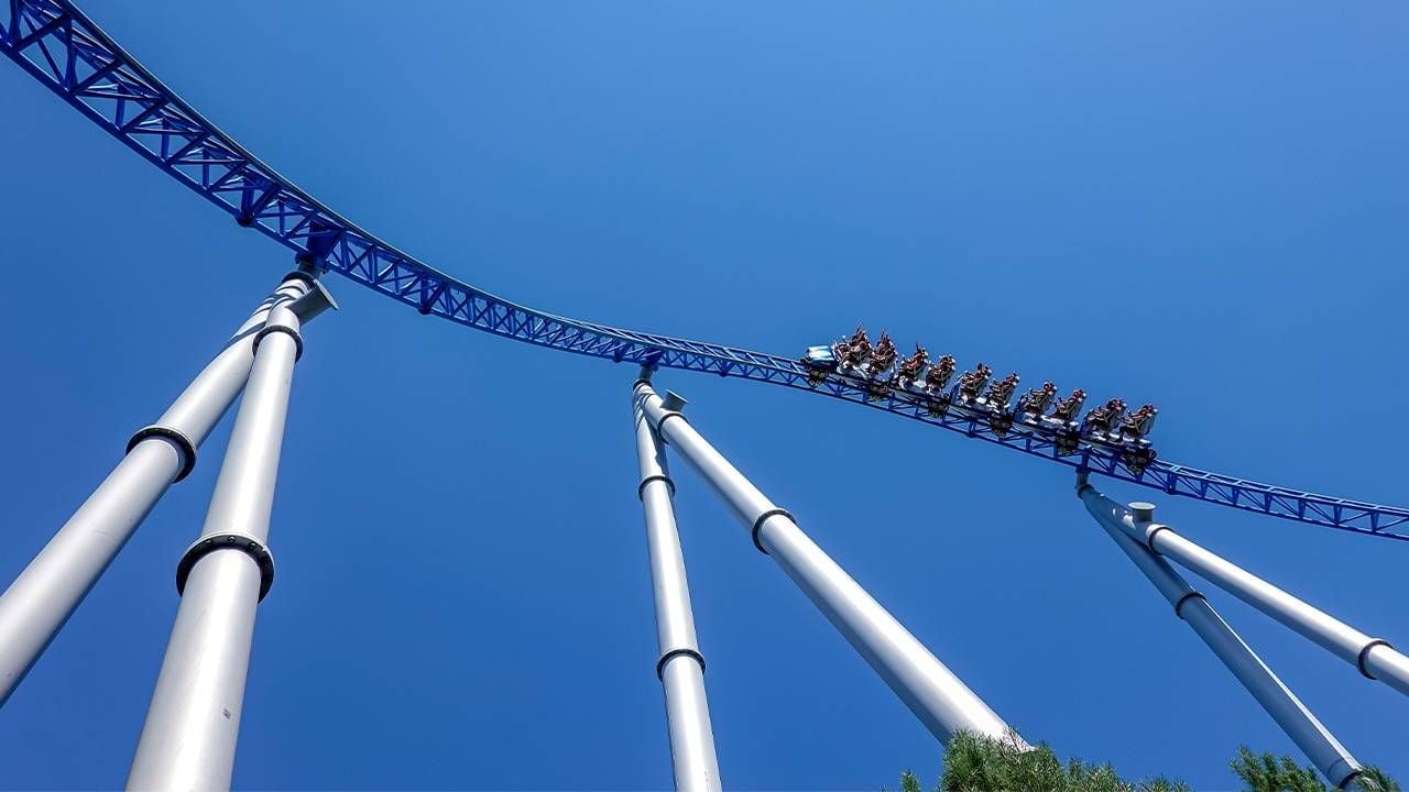 A roller coaster reaching the highest point in the ride. Next Avenue, phobias, overcoming, fear of heights