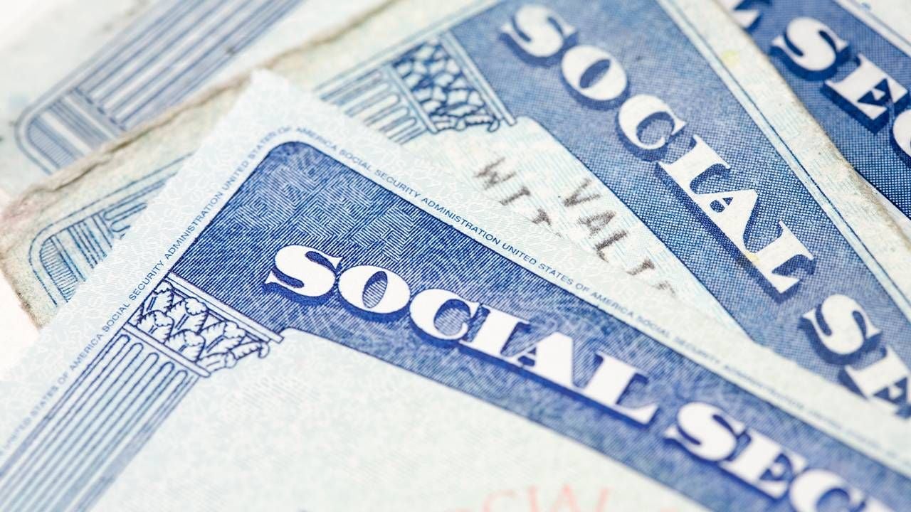 A closeup of three social security cards. Next Avenue, solvency