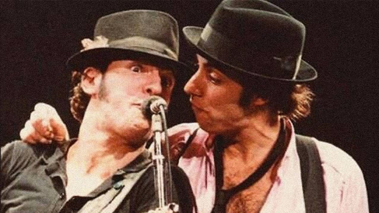 Bruce Springsteen and Stevie Van Zandt on stage singing into the microphone. Next Avenue, lilyhammer, Unrequited Infatuations