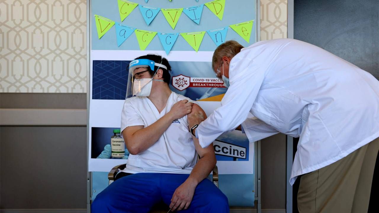 A nursing home staff member getting a COVID-19 vaccine shot. Next Avenue, Long-term care staff shortages, vaccine mandates