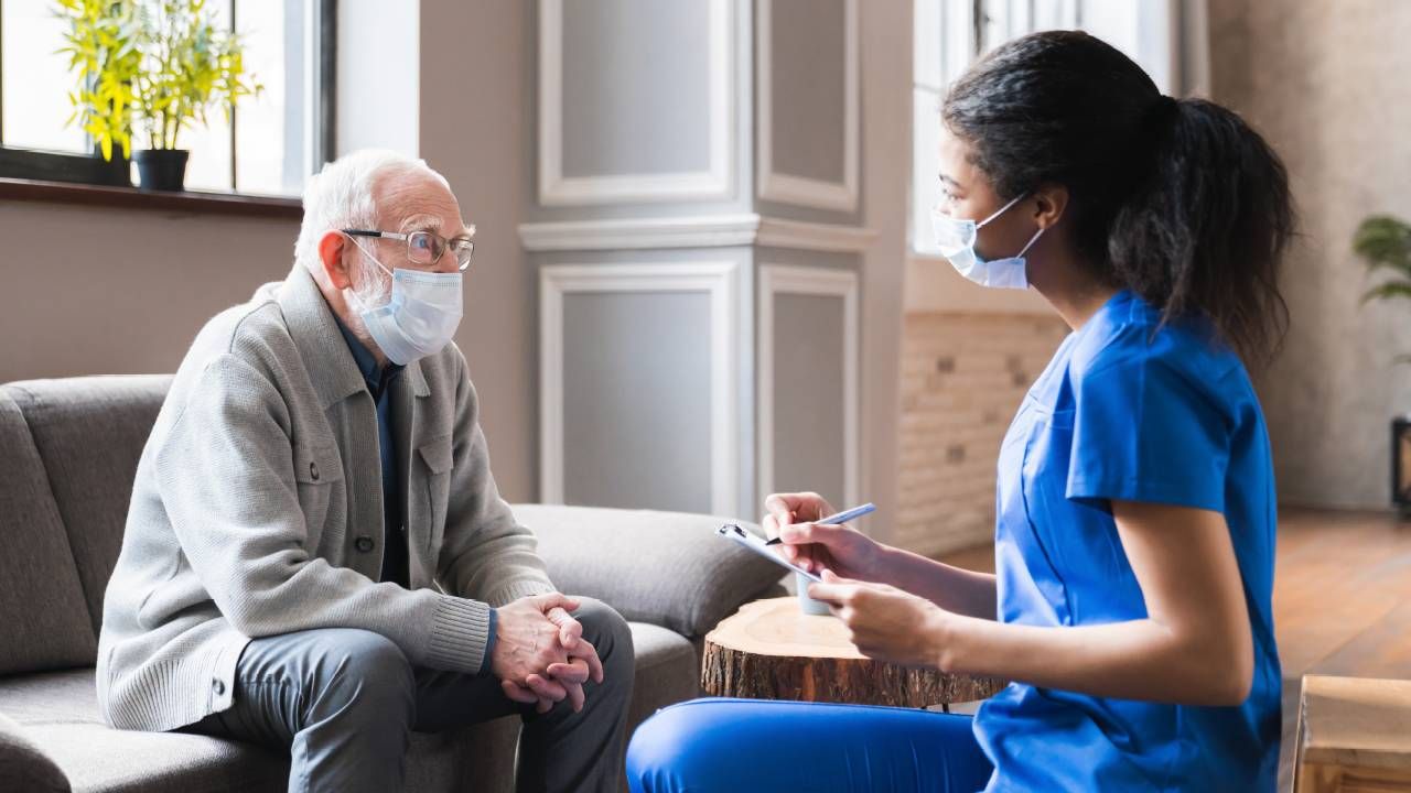 A doctor and a patient talking. Next Avenue