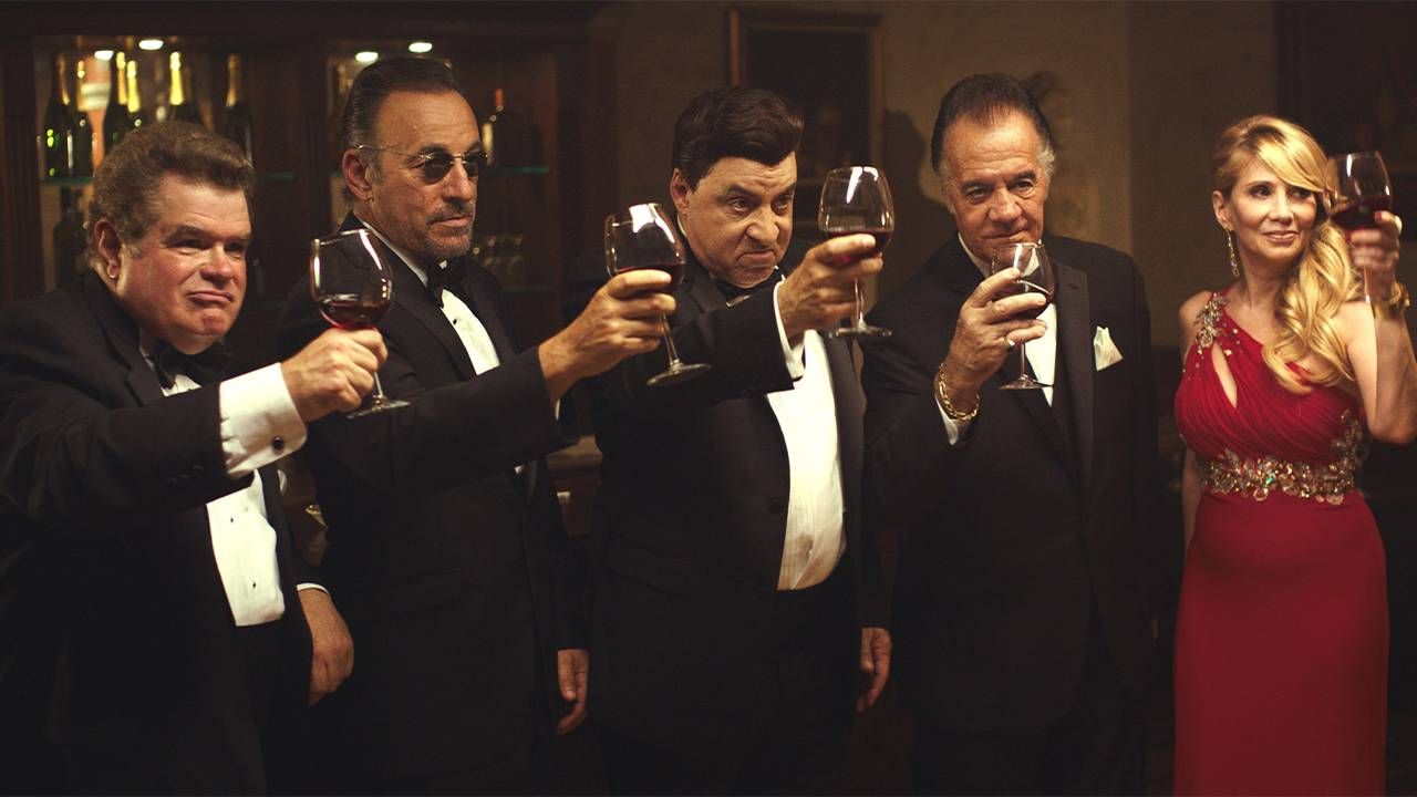 A group of people dressed up and toasting together. Next Avenue, Stevie Van Zandt, Lilyhammer, Unrequited Infatuations