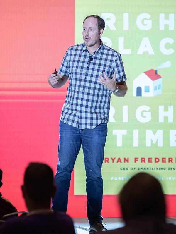 The author speaking in front of a crowd. Next Avenue, relocating in retirement, where to live in retirement