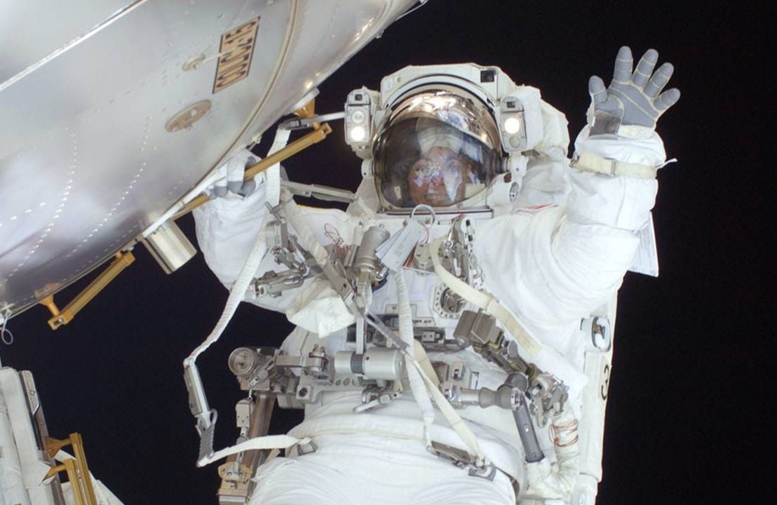 Astronaut Nicole Stott doing a space walk in outer space. Next Avenue, space