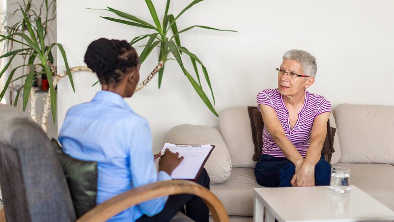 A geropsychologist counseling a patient. Next Avenue