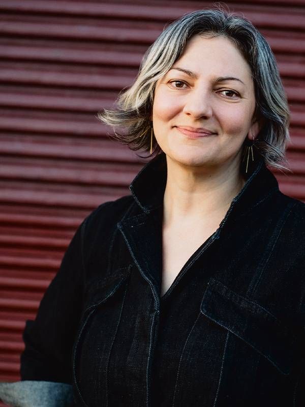 Creative Acts author Sarah Stein Greenberg smiling outside. Next Avenue