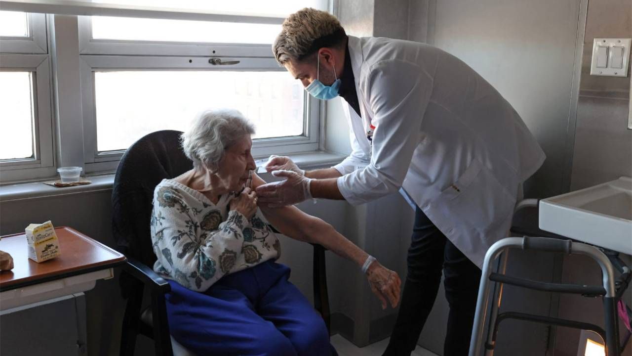 A doctor helping a nursing home resident. Next Avenue, Pennsylvania nursing homes, staff shortages