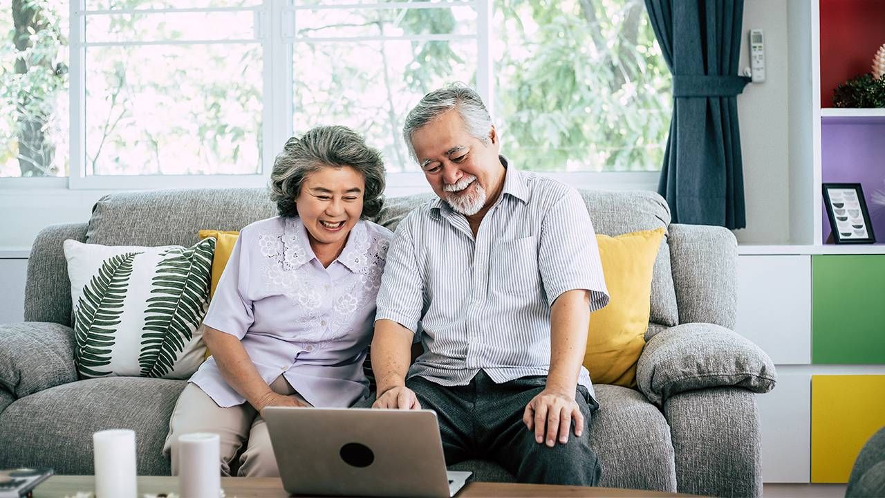 An older couple sitting down and planning their future. Next Avenue