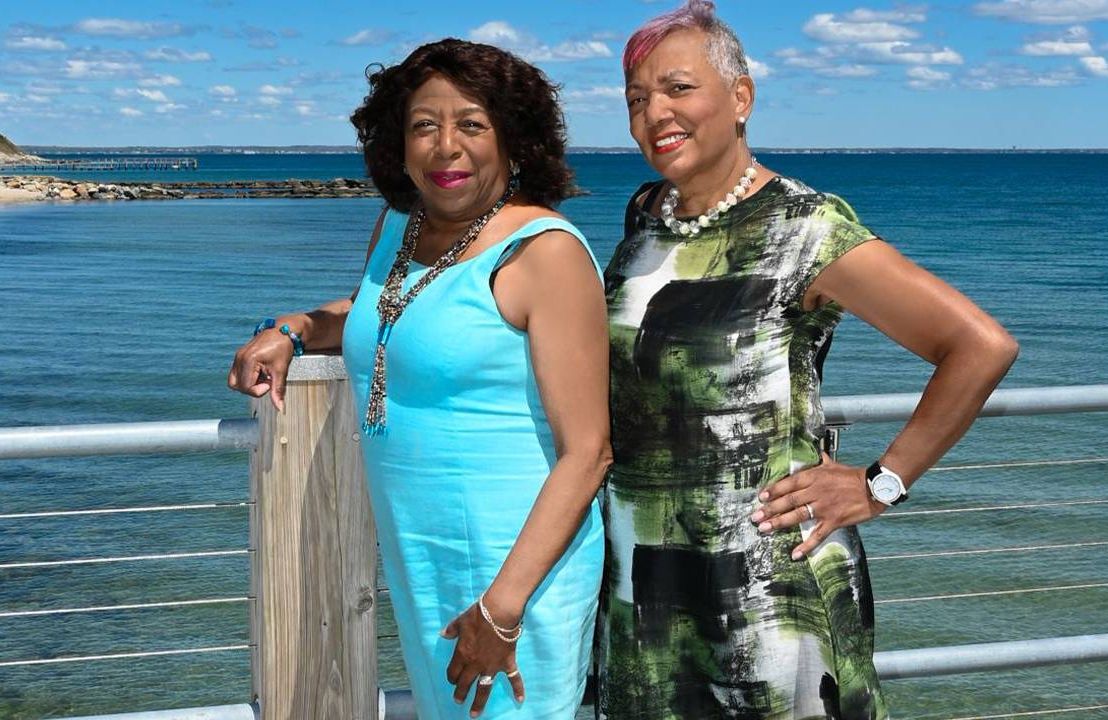 Two women entrepreneurs standing near the ocean. Next Avenue