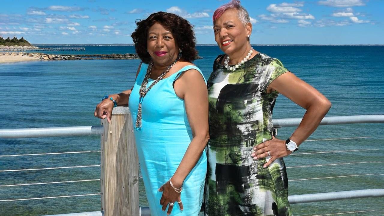 Two women entrepreneurs standing near the ocean. Next Avenue