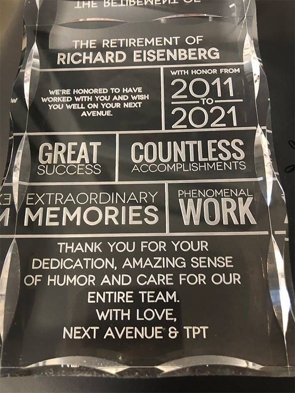 A glass plaque gift for a retirement. Next Avenue