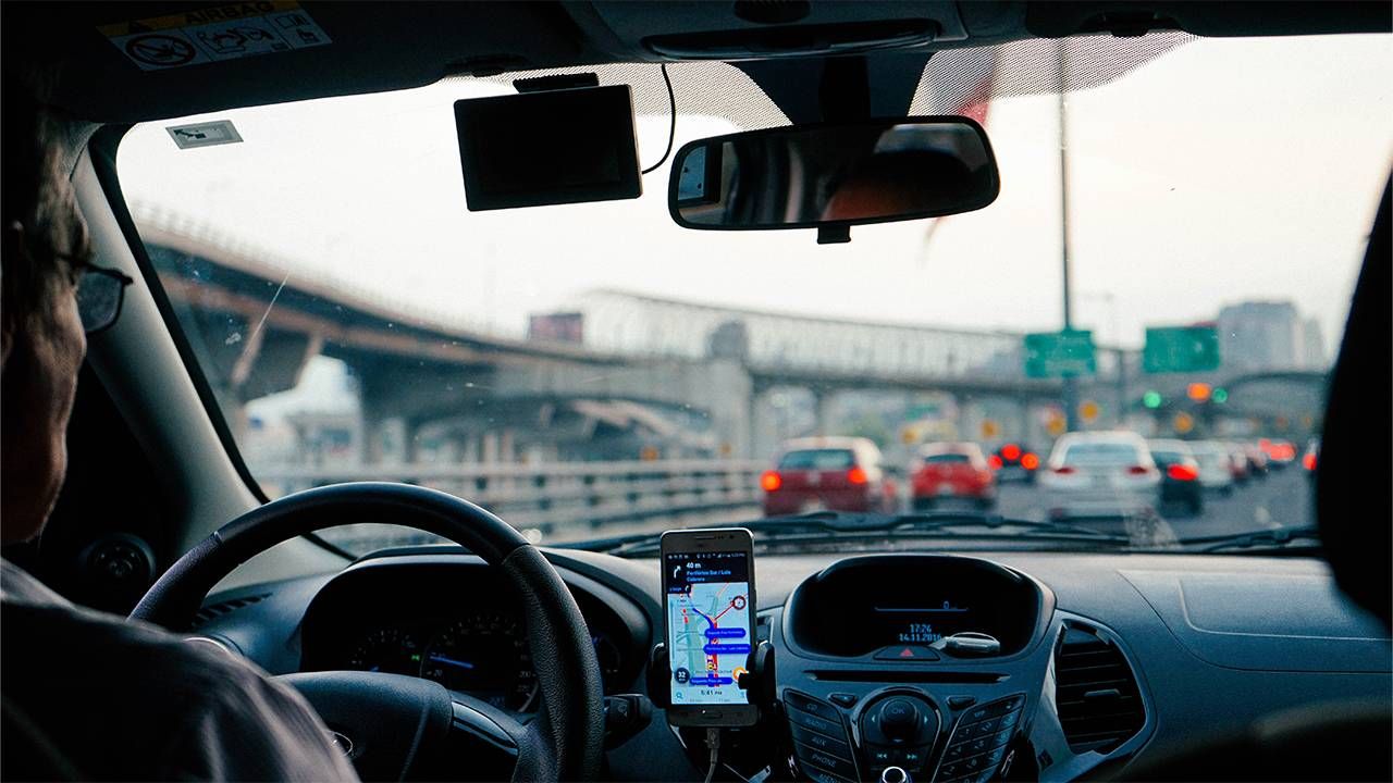 An gig worker driving an uber car. Next Avenue