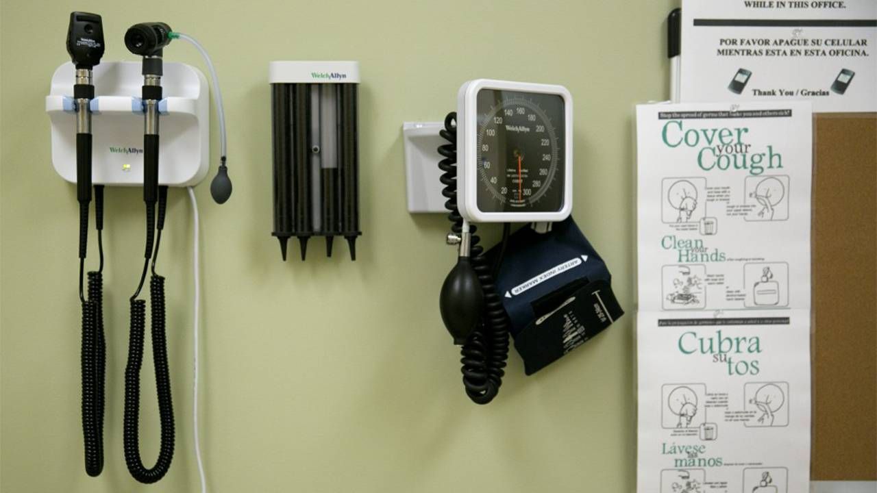A doctors supplies in a patient room and medical awareness signs on the wall. Next Avenue, health care language translation