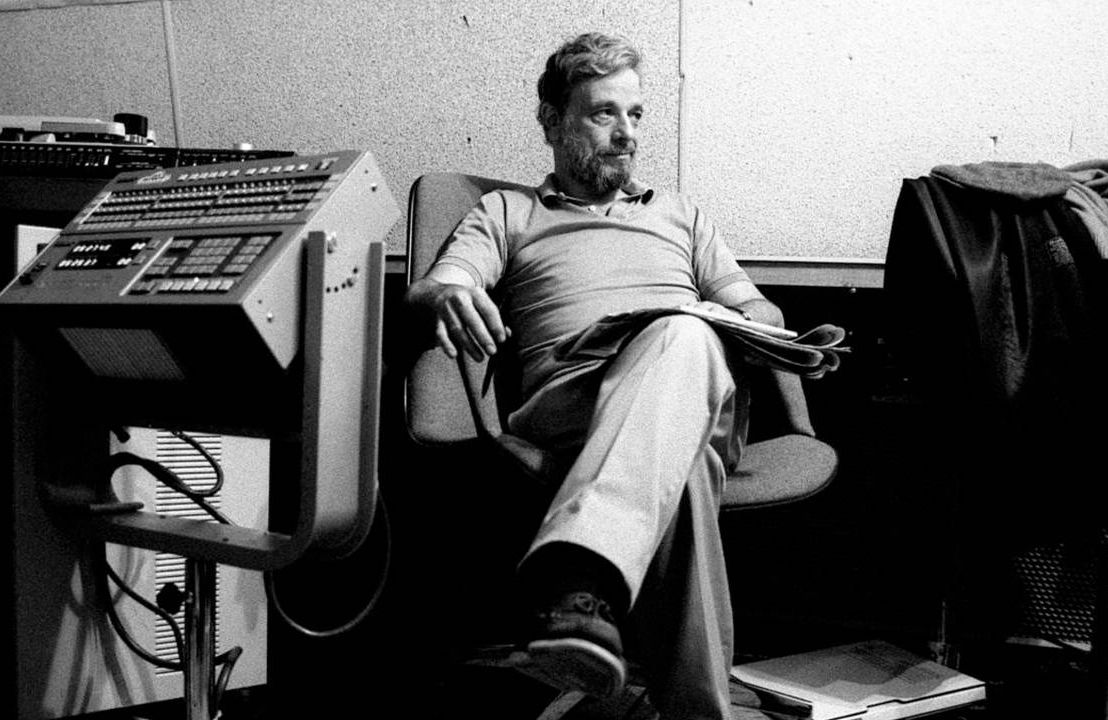 A black and white photo of Stephen Sondheim sitting in a control room. Next Avenue