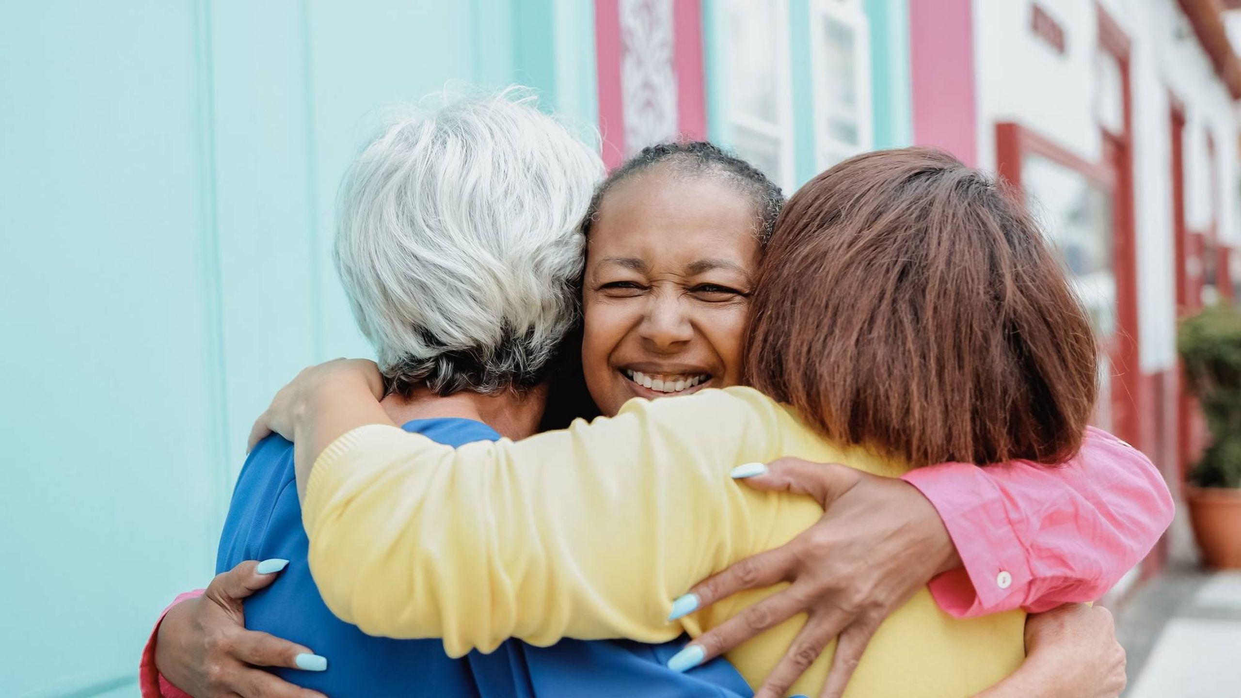 older adults hugging, older adult hands