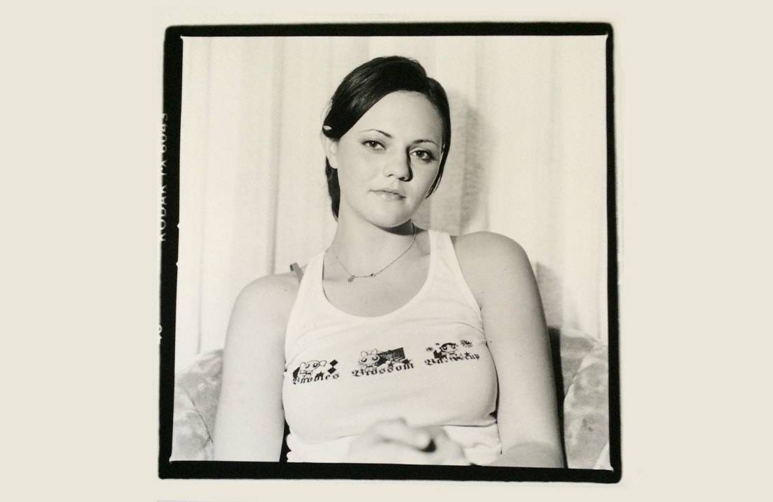 A black and white photograph of a women with dark hair wearing a tank top from The Donnas. Next Avenue, Gerontology