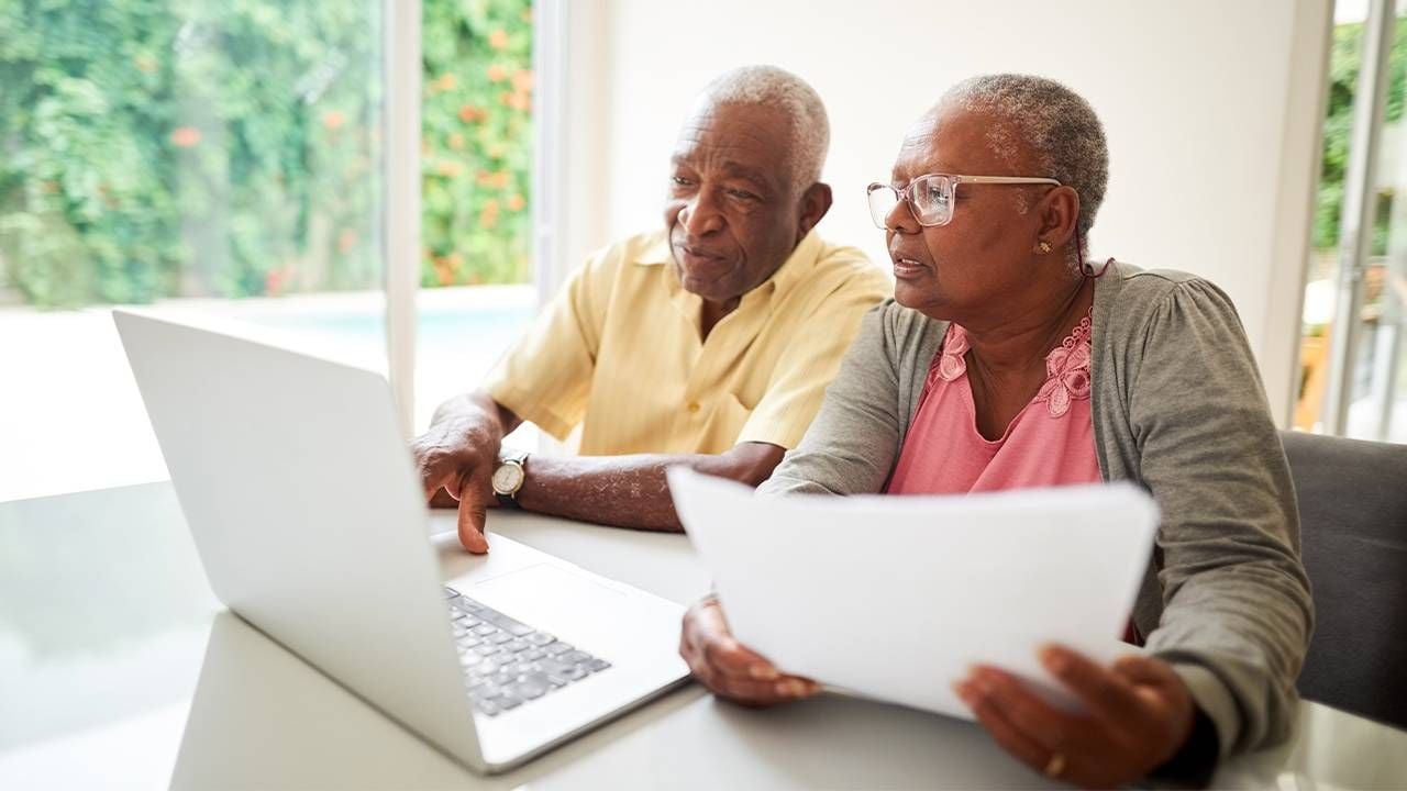 An older couple on the computer planning out their long term care options. Next Avenue