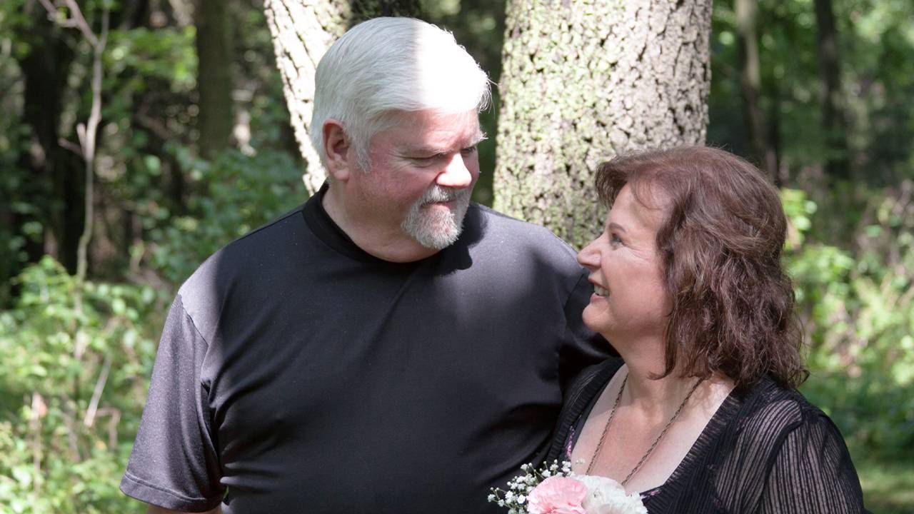 A couple posing for their wedding photo. Next Avenue, online dating