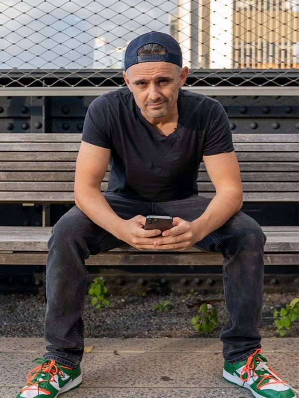 An older adult sitting on a bench wearing sneakers. Next Avenue, marketing strategies, mid-life entrepreneurs, small business