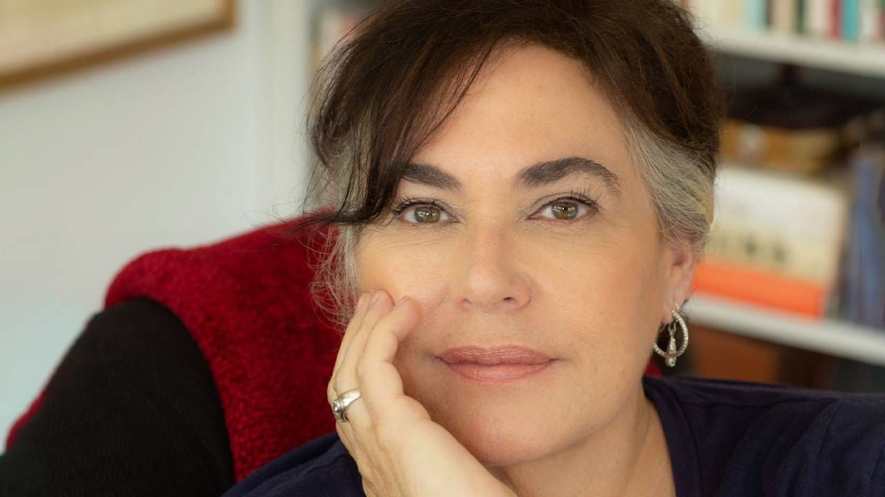 Author Amy Bloom sitting at home in a chair. Next Avenue, In Love Memoir of Love and Loss