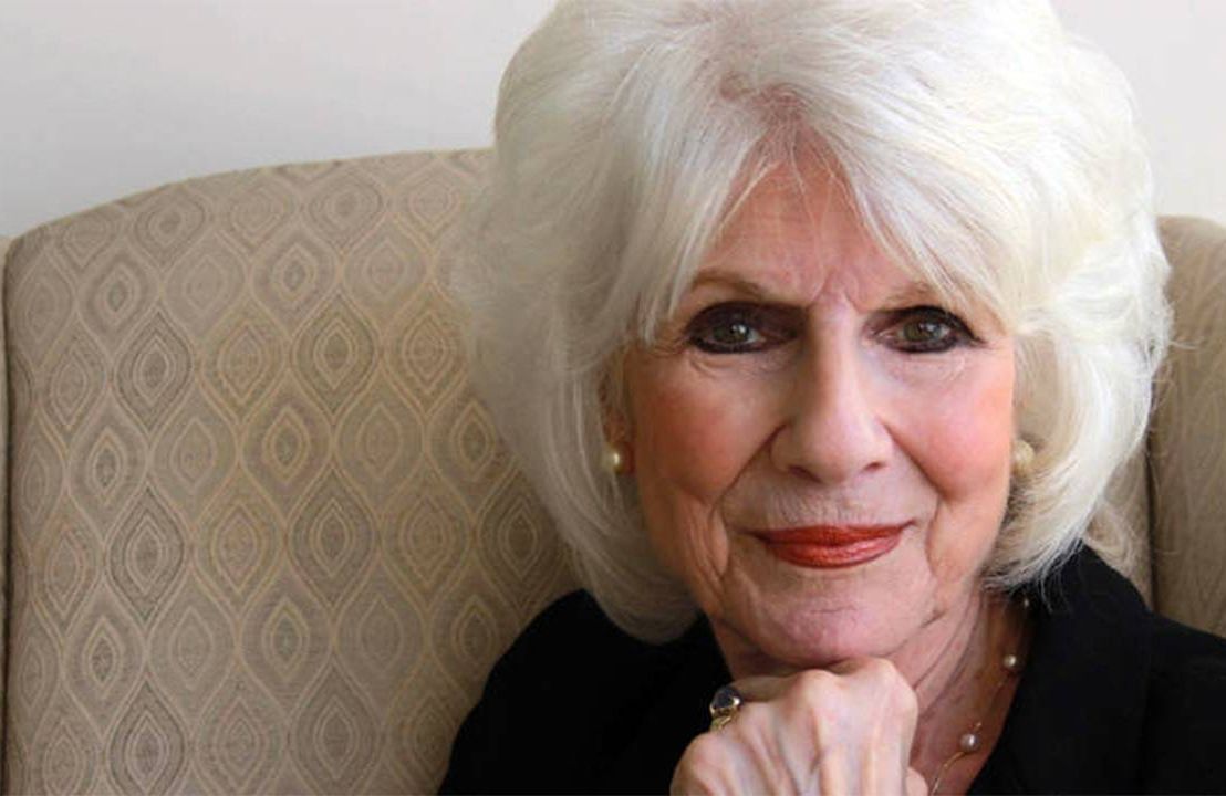 Diane Rehm smiling while sitting in a chair. Next Avenue, medical aid in dying