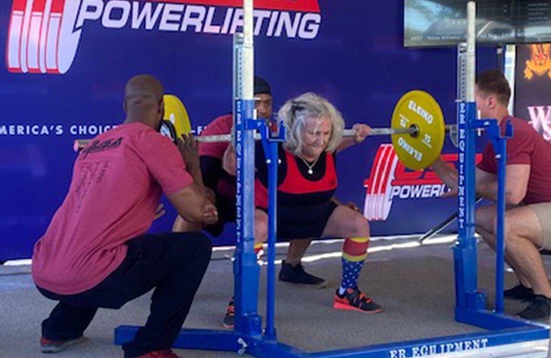 An older adult during a powerlifting competition. Next Avenue, lifting over 50, strength training
