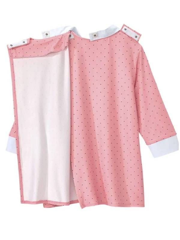 A pink blouse with snaps on the shoulders that allow it to open completely from the back. Next Avenue, resources for dementia caregivers