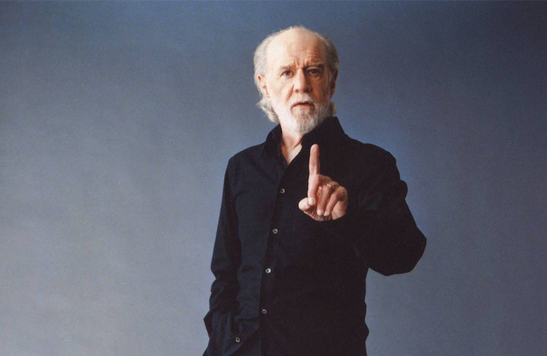 George Carlin wearing a black shirt. Next Avenue, Judd Apatow, George Carlin's American Dream