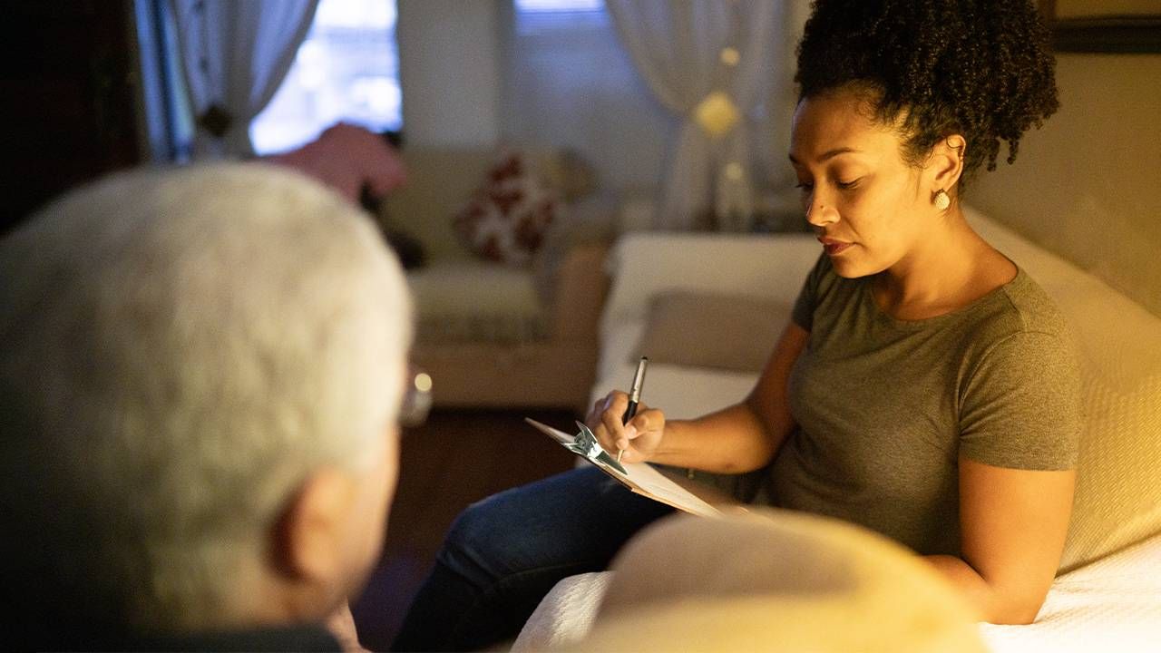 An older adult speaking with a therapist counselor for their mental health. Next Avenue, COVID-19, older adults