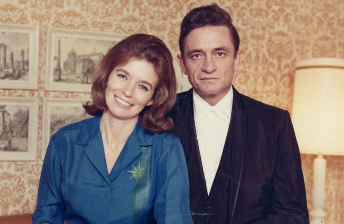 Johnny Cash and June Carter smiling next to each other. Next Avenue, broken heart syndrome, widow, widower