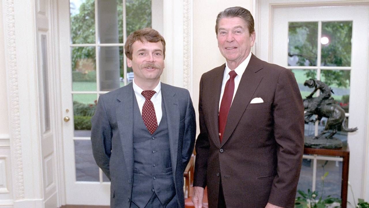 Two men wearing suits smiling inside the white house. Next Avenue, LGBTQ history, Washington d.c.