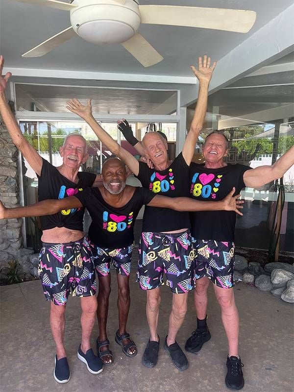 A group of older adults wearing 80s style clothing. Next Avenue, The Old Gays, social media older adults