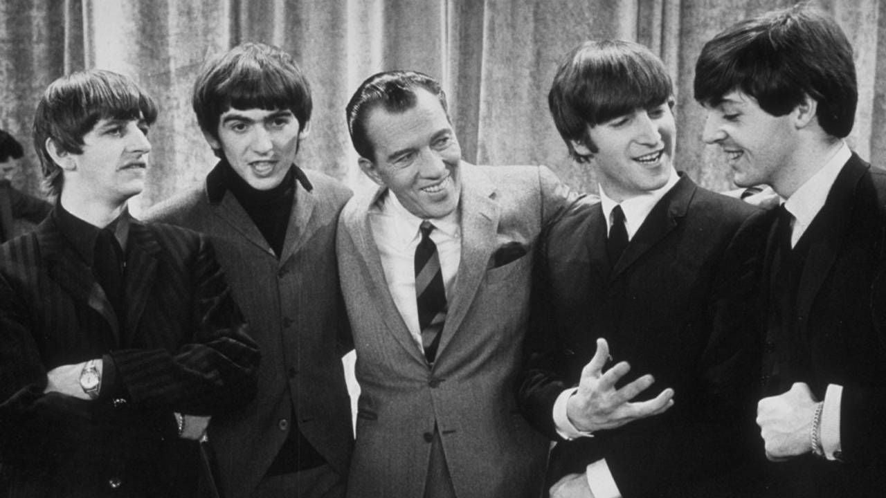 An old photo of the Beatles smiling on a TV show. Next Avenue, Paul McCartney turns 80