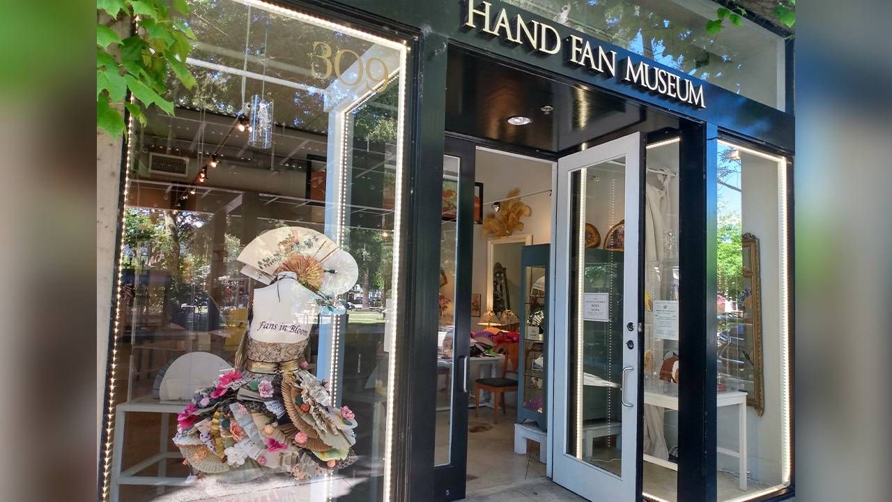 The exterior of the Hand Fan Museum, with colorful window displays. Next Avenue, vintage hand fan collectors