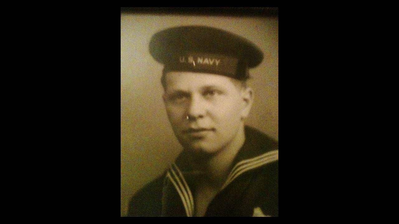An old headshot of a man wearing a U.S. Navy uniform. Next Avenue, father's advice