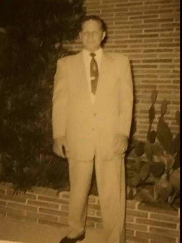 An old photo of a man wearing a suit and tie. Next Avenue, father's advice