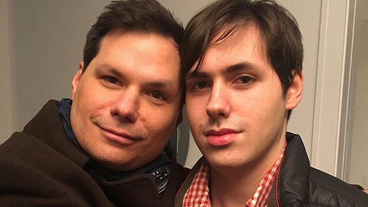 A close up of Michael Ian Black hugging his son. Next Avenue, A Better Man