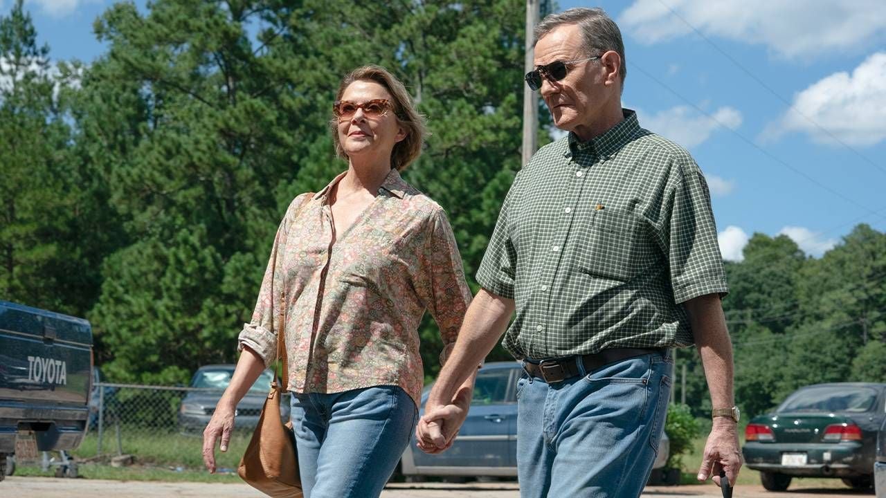 Two actors holding hands and walking down a street. Next Avenue, Bryan Cranston, Jerry and Marge Go Large, ageism in entertainment