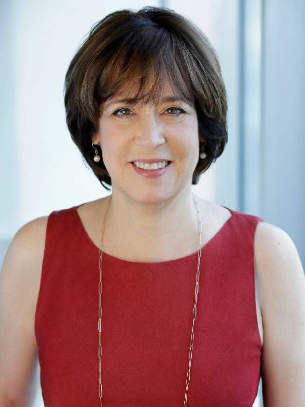 Headshot of a woman wearing a red dress. Next Avenue, Gabby Giffords documentary