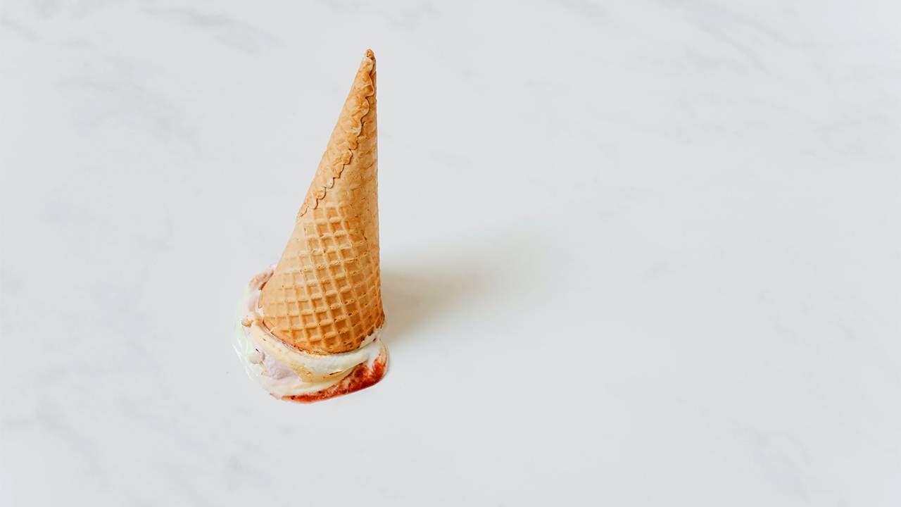 An upside down ice cream cone on a white background. Next Avenue, difficulties of healthy lifestyle