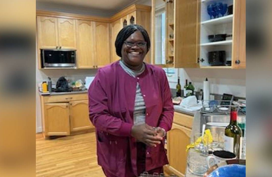 A woman standing in a kitchen and smiling. Next Avenue, starting a business