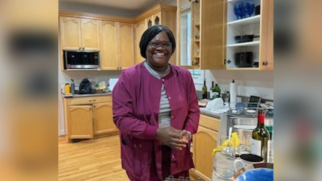 A woman standing in a kitchen and smiling. Next Avenue, starting a business