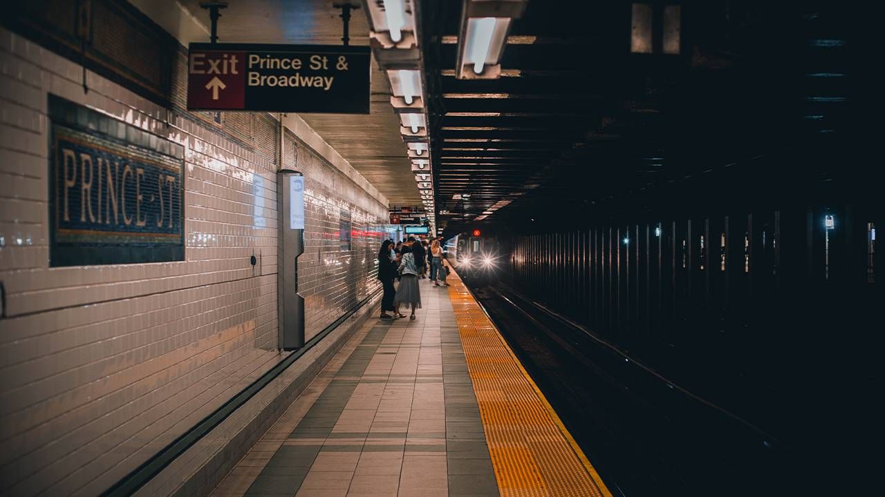 People waiting at a subway stop. Next Avenue, why change is good