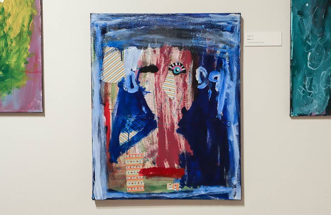 A colorful self-portrait hanging on a gallery wall. Next Avenue, older adults with disabilities