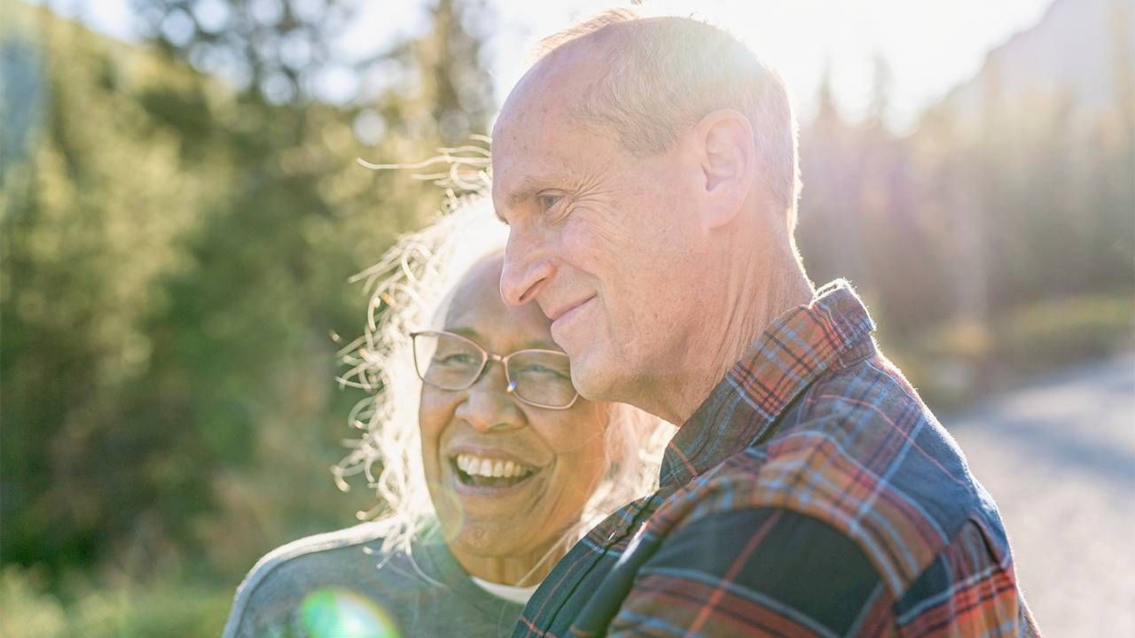 An older couple smiling. Next Avenue, long-term care
