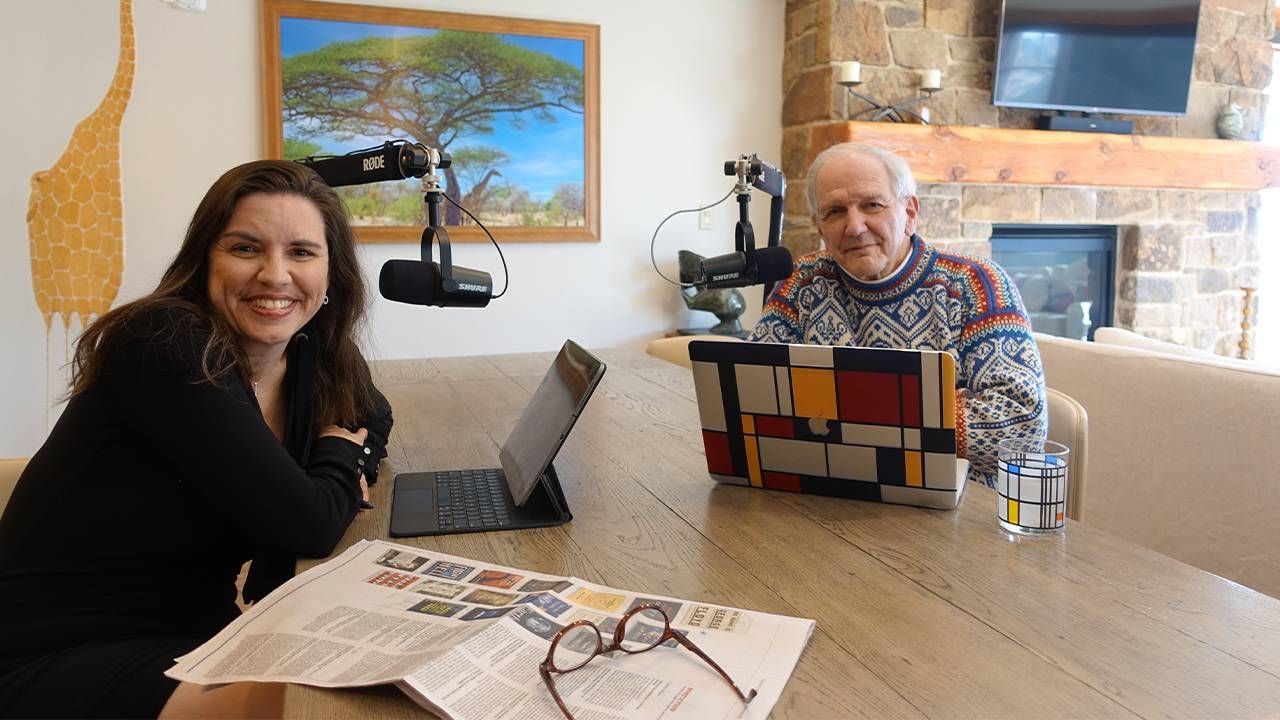 Charlie and Kate Gibson sitting at a table at home recording their Bookcase podcast. Next Avenue, good morning america, gma