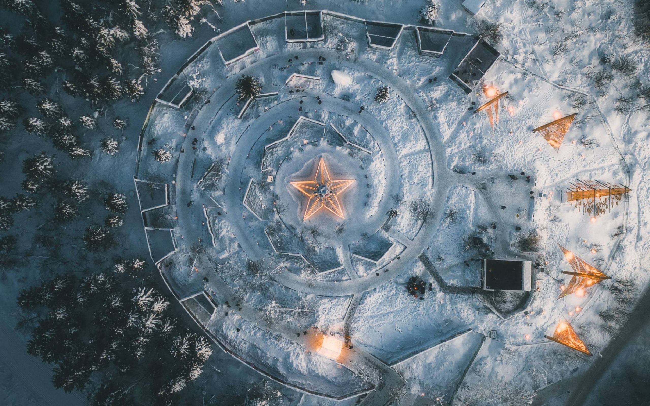 An aerial view of an outdoor park with trees and snow. Next Avenue, Rose Castle, Norway