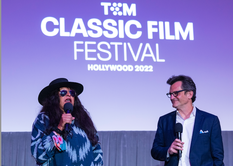 TCM hosts and Pam Grier speak onstage at the Media Welcome Reception in the Hollywood Roosevelt Blossom Room during the 2022 TCM Classic Film Fest